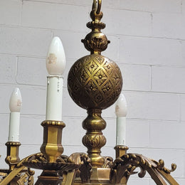 Stunning six arm French bronze chandelier. It can be used with or without shades. It has been fully rewired to Australian standards. It is in good original detailed condition.