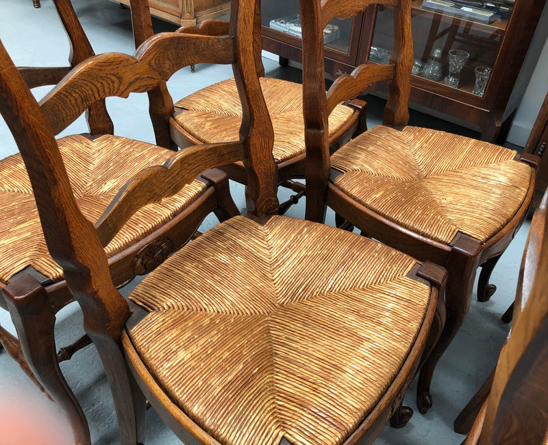 Set of six French rush seat dining chairs and in good sturdy condition.