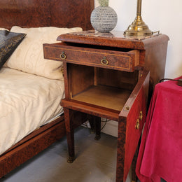 French Art Deco bedroom suite consisting of queen size bed in Amboyna wood and featuring pretty inlay. It comes with a matching pair of bedsides. It is a very stylish and high quality suite. It has been sourced from France and is in good original detailed condition.