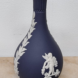 Wedgwood blue and white Jasper Ware bud vase. It is in good original condition with no chips or cracks, please view photos as they help form part of the description.