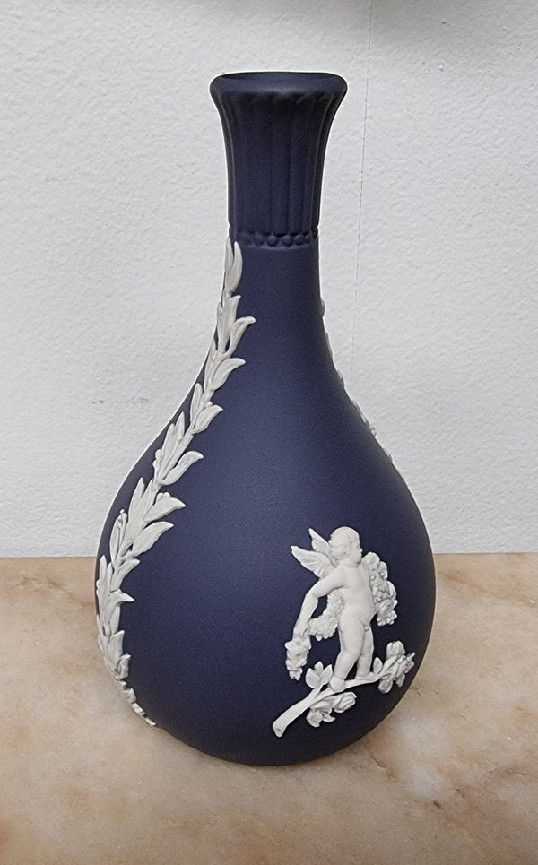 Wedgwood blue and white Jasper Ware bud vase. It is in good original condition with no chips or cracks, please view photos as they help form part of the description.