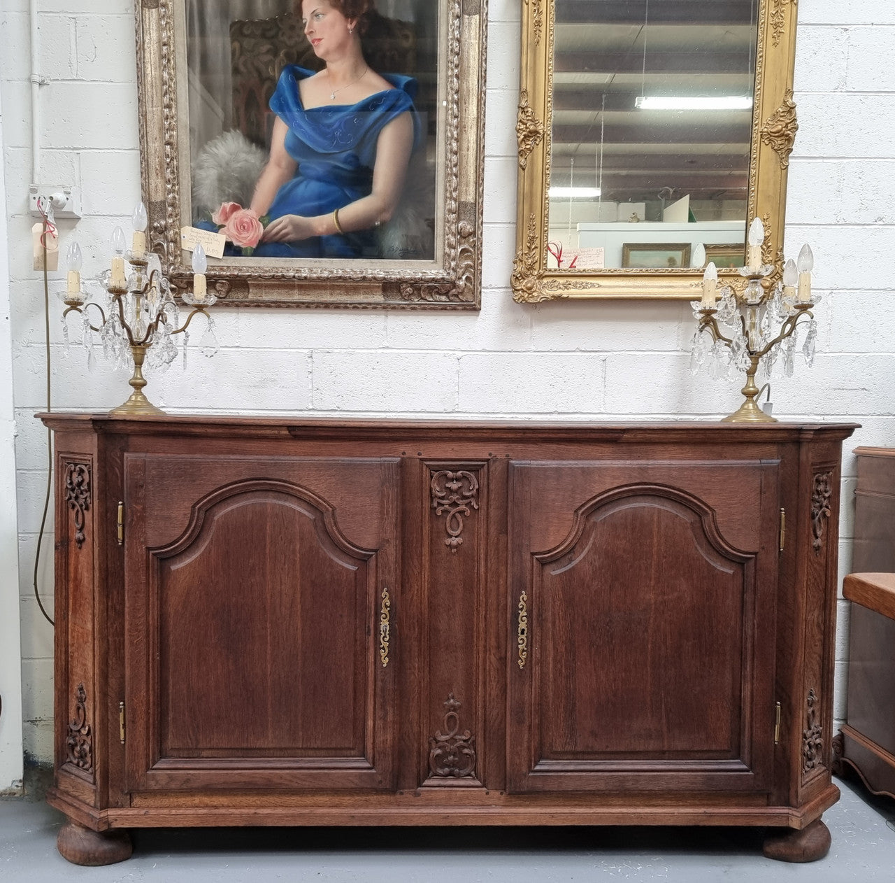 Late 18th Century French Oak carved two door sideboard. In good original detailed condition.