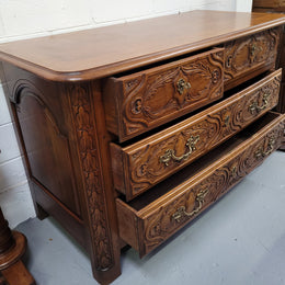 French Cherrywood Louis XIV style wooden topped chest of four drawers. It has been sourced from France and is in good original detailed condition.