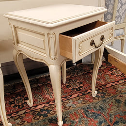 Pair French Vintage Louis XV style soft Ivory single drawer bedside tables. They have been sourced from France and are in good original condition.