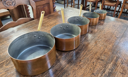 Set of Five French Vintage Copper & Brass Saucepans. They are in good original condition.