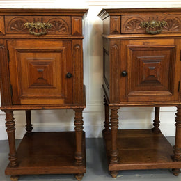 Pair of French Oak Arts and Crafts bedsides cabinets with lovely Carrara marble top and drawer and cupboard for storage. In good original detailed condition.