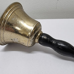 Wooden handled brass bell. It is in good original condition and has been sourced locally. Please view photos as they help form part of the description.