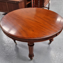 Amazing Victorian round Mahogany extension table. It comes with one extension leaf which can be added to the center of table when required. Sourced Locally and in good original detailed condition.
