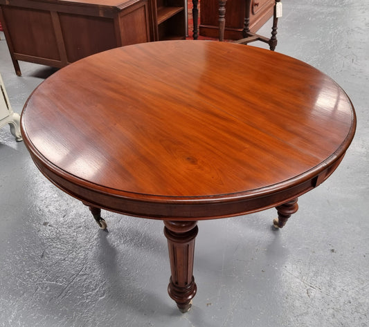 Amazing Victorian round Mahogany extension table. It comes with one extension leaf which can be added to the center of table when required. Sourced Locally and in good original detailed condition.