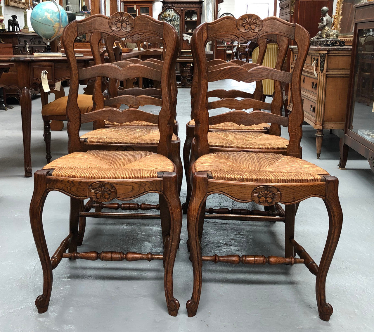 Set of six French rush seat dining chairs and in good sturdy condition.