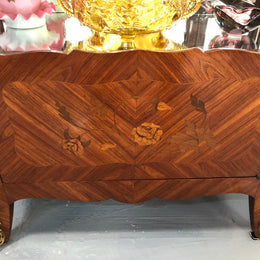 A Louis XV style Kingwood vitrine with marble top. It has beautifully floral inlay with ormolu mounts.
