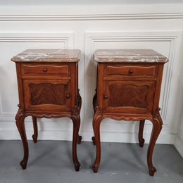 French Louis XVI style figured Walnut marble top bedsides. In good original detailed condition.