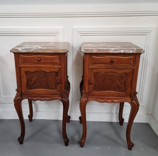 French Louis XVI style figured Walnut marble top bedsides. In good original detailed condition.