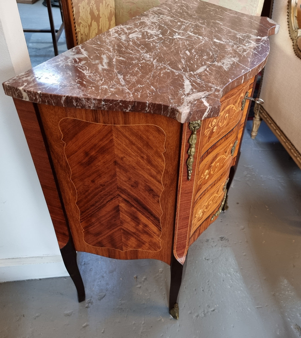 Lovely french 3 drawer Rosewood and Kingwood ,marquetry inlaid commode. There are 3 drawers and a lovely marble top with ormolu mounts in good original detailed condition.
