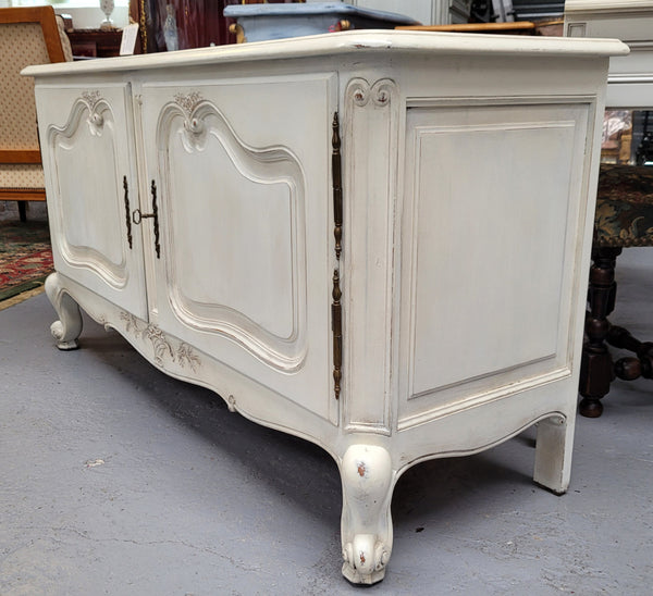 Louis XV style chalk painted two door cabinet which would also make an ideal TV cabinet. It has been sourced from France and in good original detailed condition.