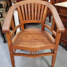 Vintage teak "Captains Chair". It is well built and very comfortable to sit in. It is in good original detailed condition.