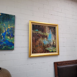 A beautiful Framed oil on canvas in vibrant colours and framed in a lovely gold frame. This piece is signed by artist John Cumming from "The Mill Gallery" and still has its original gallery card as shown in picture. It is in good original condition.