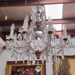 Sourced From France an attractive eight arm French crystal chandelier. It has been fully rewired to Australian standards and is in good original working condition.