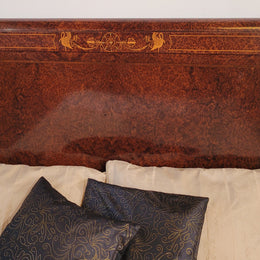 French Art Deco bedroom suite consisting of queen size bed in Amboyna wood and featuring pretty inlay. It comes with a matching pair of bedsides. It is a very stylish and high quality suite. It has been sourced from France and is in good original detailed condition.