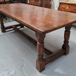 Vintage French Oak stretcher base farmhouse table. It is in good original condition.