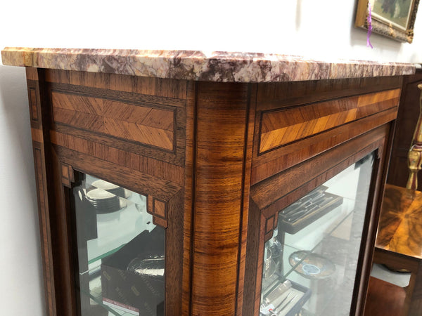 Beautiful French walnut and parquetry inlaid vitrine with lovely bevelled glass and a marble top. It comes with four glass shelves which are adjustable and it is in good original condition.