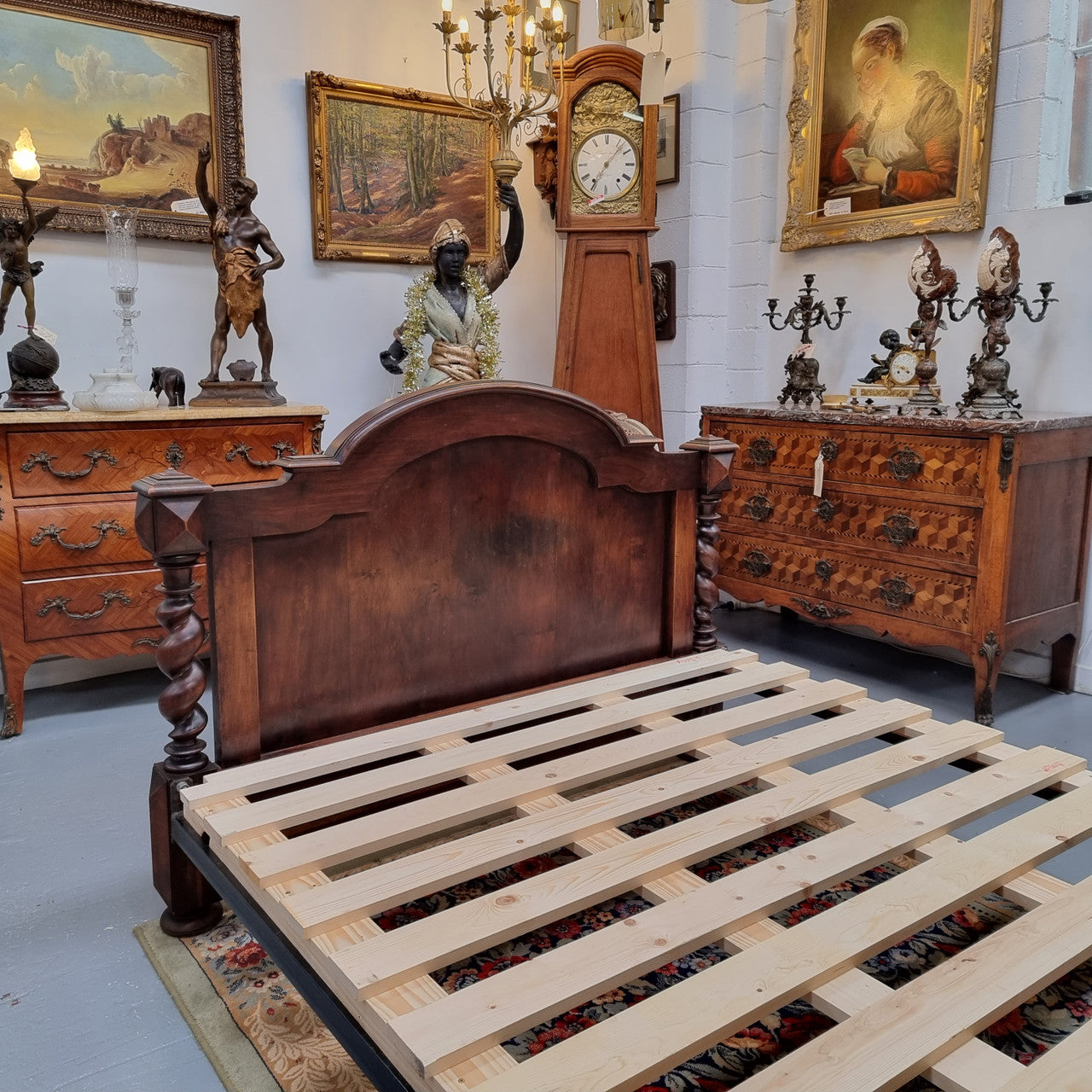 French 19th Century Walnut Henry II style queen sized bed with Barley Twist posts. Bed comes complete with custom made slats. Just place your mattress on top. In good original detailed condition.