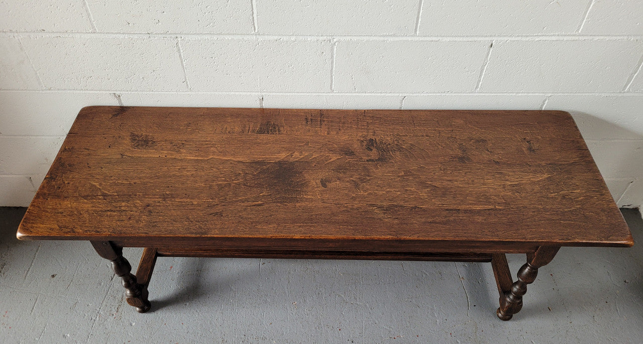 Rustic French Oak pedestal base coffee table. It is in good original detailed condition.