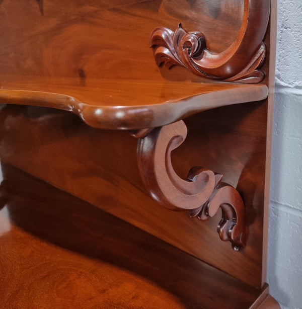 Beautiful Antique Victorian Mahogany two door Chiffonier. Plenty of storage space with one drawer and the two doors open up to a shelved area. It is in good restored condition.