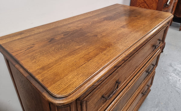 French solid Oak Louis 14th style chest of three drawers. It has three large spacious drawers and it has been sourced from France. It is in good original detailed condition.