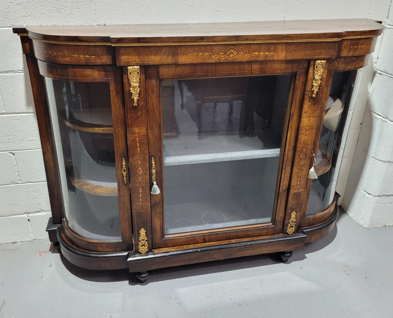 Victorian Rosewood inlaid side cabinet/credenza with velvet lined shelves and gilt mounts. It has been sourced locally and is in good original condition with loads of character.
