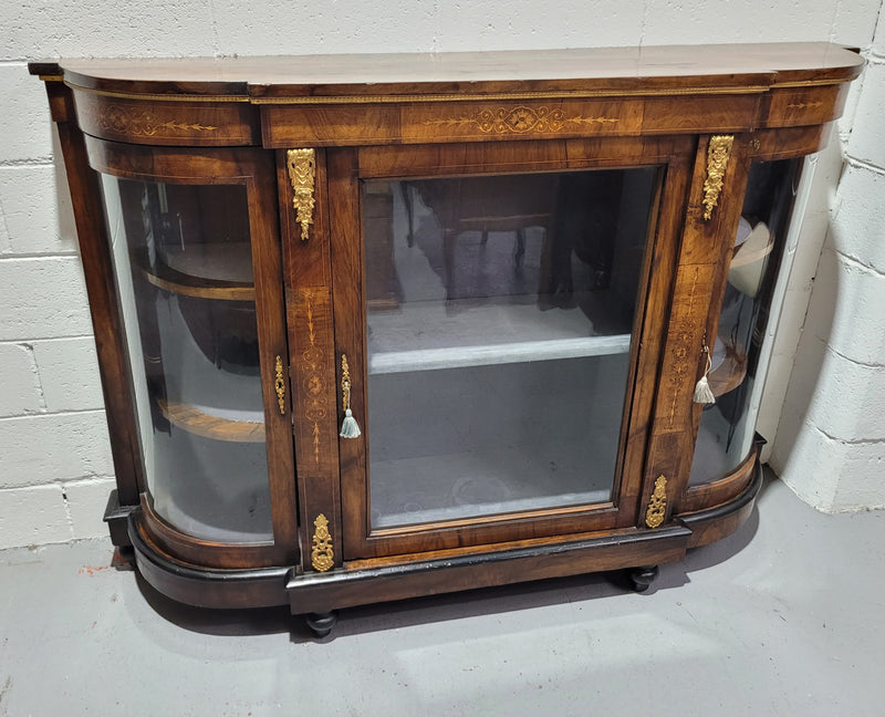 Victorian Rosewood inlaid side cabinet/credenza with velvet lined shelves and gilt mounts. It has been sourced locally and is in good original condition with loads of character.