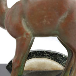 Absolutely gorgeous French cold painted metal Art Deco Statue of a lady and two deers on a marble base. Signed piece and in good original condition.