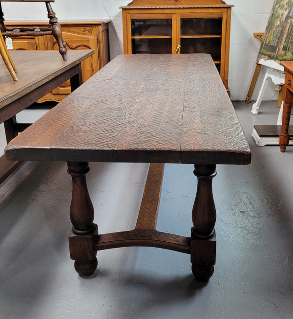 Desirable rustic French oak farmhouse table with stretcher base and turned legs. Circa 1950’s and can comfortable seat 6-8 people. Sourced from France and is in good detailed condition.