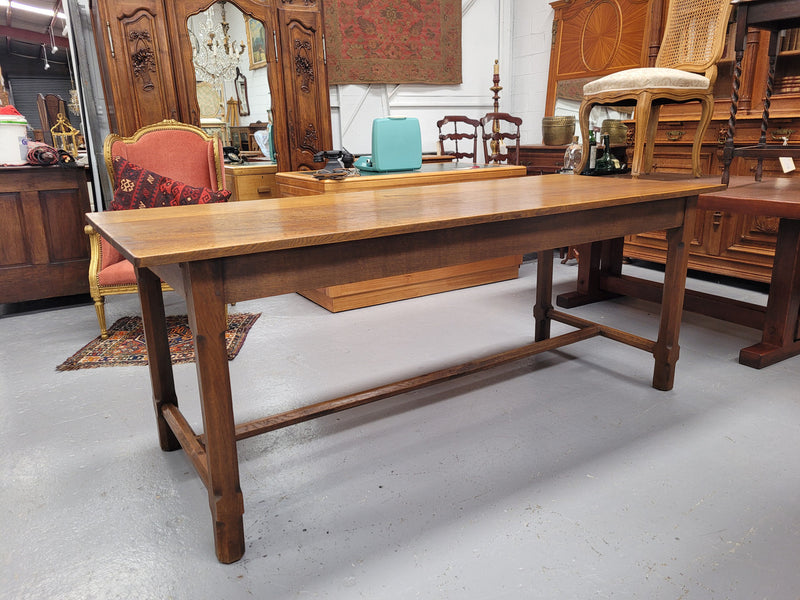 Stunning French oak stretcher base table, that has been sourced from France. It is in good original condition. Please see pictures to form part of the description.