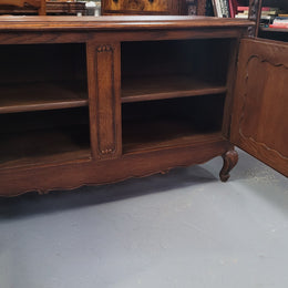 A hard to find Louis XV style French two door cabinet which would make an ideal TV cabinet. It has been sourced from France and in good original detailed condition.