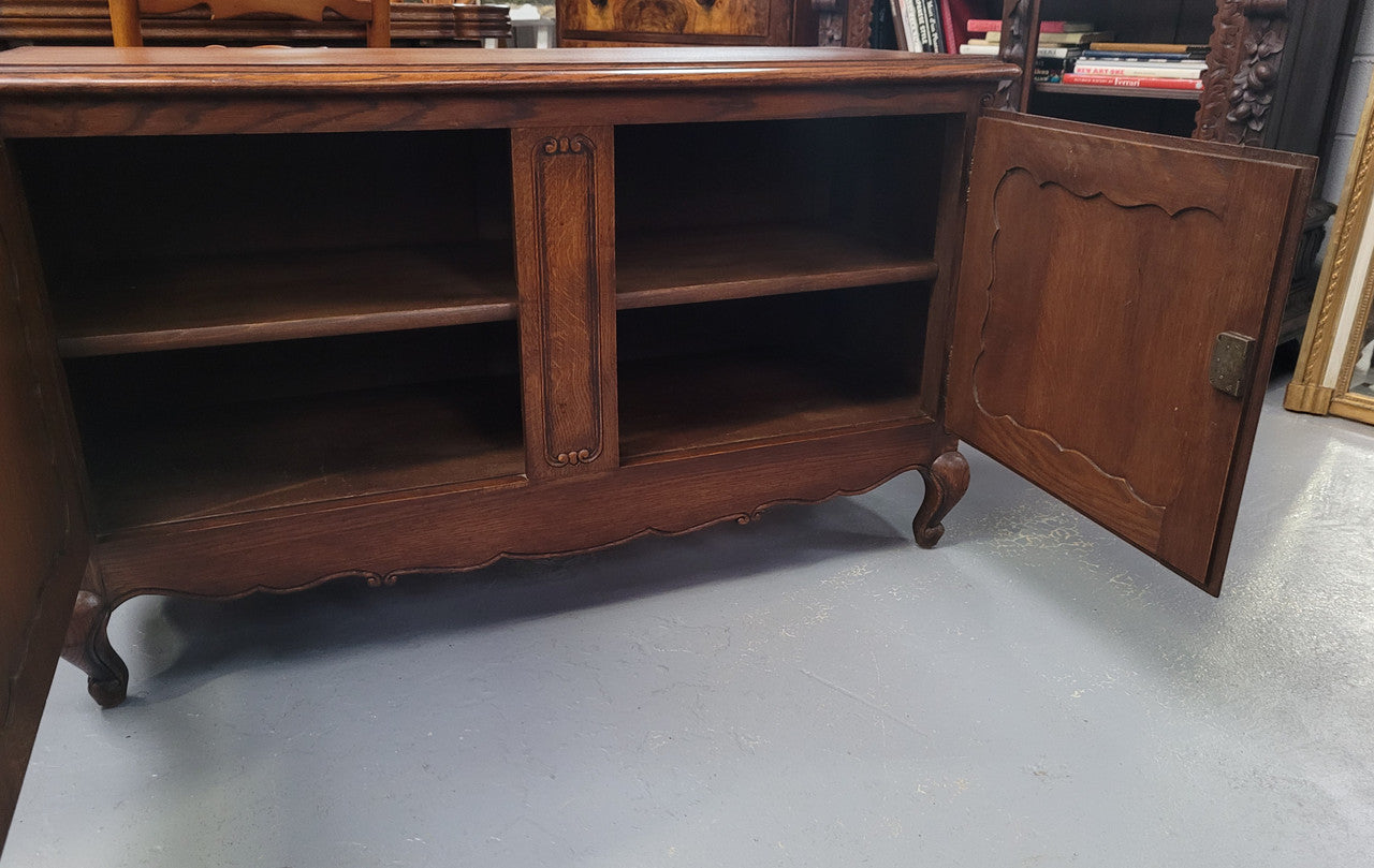 A hard to find Louis XV style French two door cabinet which would make an ideal TV cabinet. It has been sourced from France and in good original detailed condition.