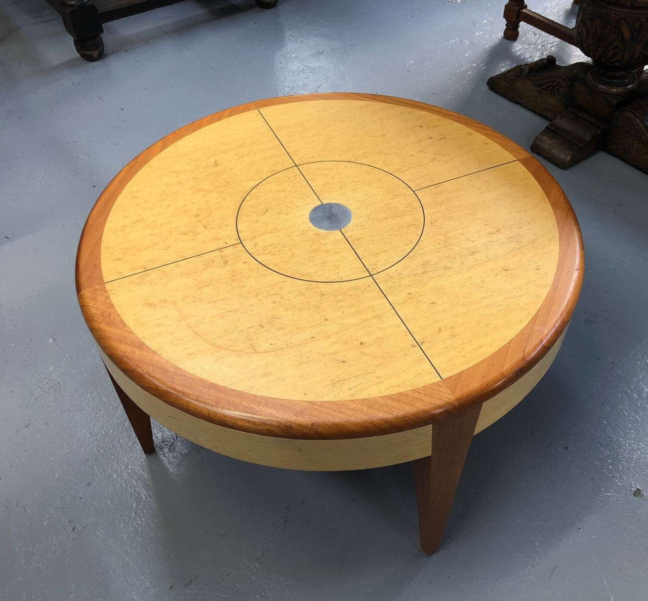 Lovely Vintage round Mahogany and blonde wood coffee table by (Alexander J Cook). It is in good original condition.