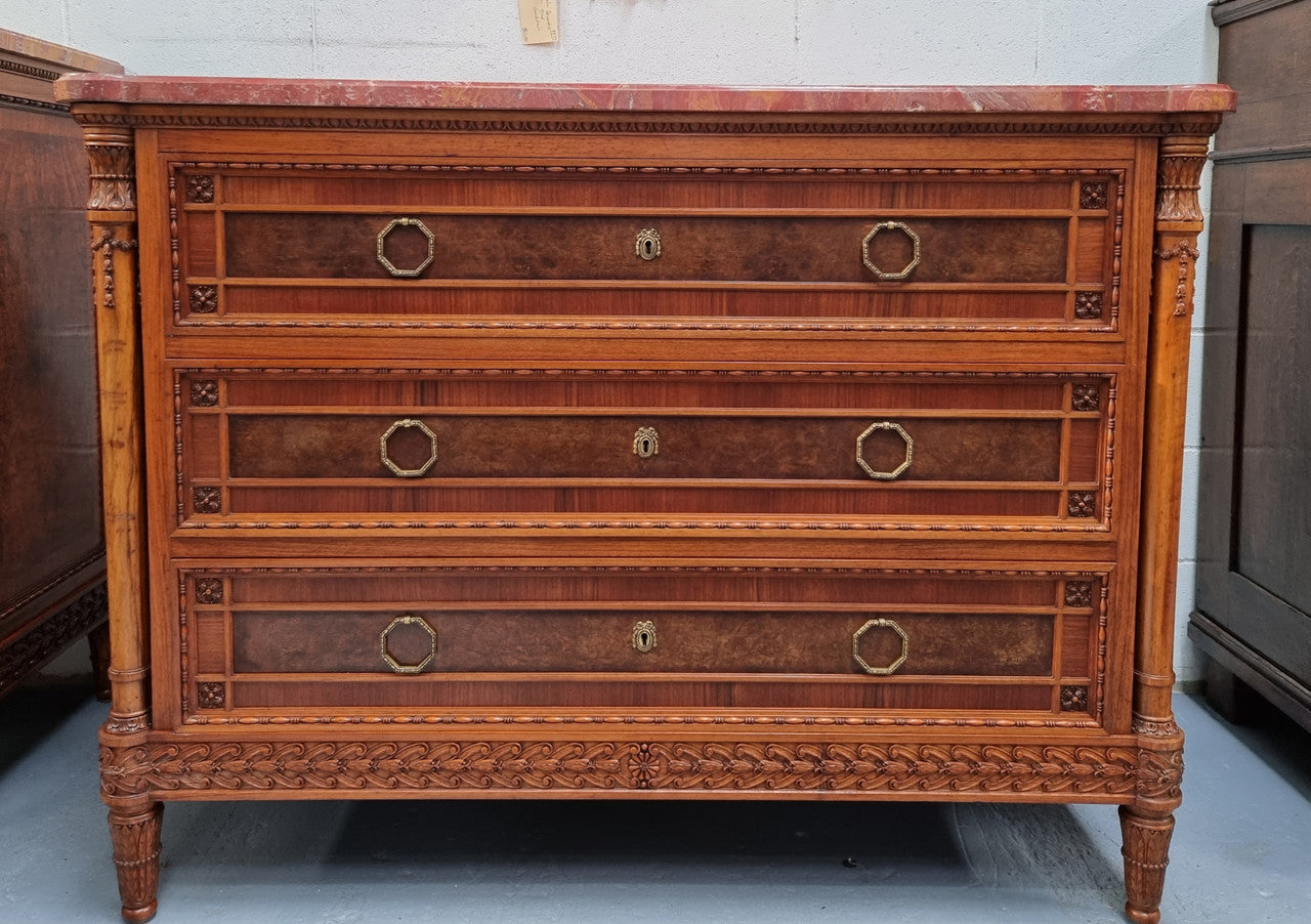 Lovely decorative French walnut and burr Walnut 3 drawer commode with a stunning coloured marble top and lovely carved details. In very good detailed condition.