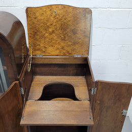 Art Deco Walnut display / drinks cabinet consisting of two glass door display and two door cupboard. Top section also lifts up and turns into a drinks area. All with original handles and in good original detailed condition.