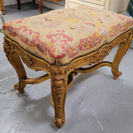Charming 19th Century gilt wood tapestry covered Louis XV style stool. It has a beautifully carved base and undercarriage and it has been sourced from France. It is in good original detailed condition, please view photos of tapestry has they help form part of the description.