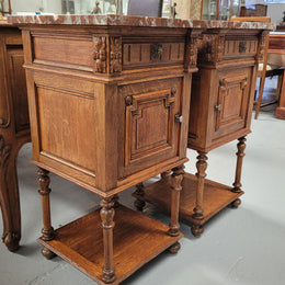 Pair French Oak Henry II style rouge marble topped bedside cabinets. Consisting of one drawer, one cupboard and a bottom shelf. Carved decoration and turned legs. Circa: 1900's.