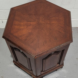 Hexagonal Mahogany enclosed side cabinet with two doors. Would make an ideal side cabinet and is in good restored condition.