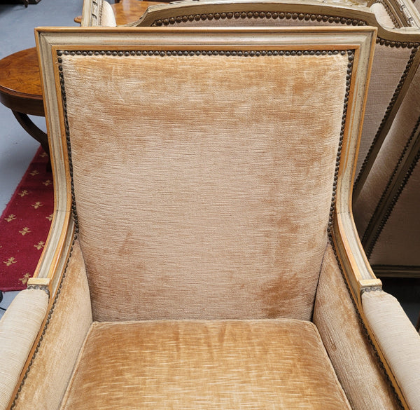 Pair of Louis XVI style painted arm chairs with carving & fluted legs. They have been sourced from France and the fabric is in good used original condition. Please view photos as they help form part of the description.