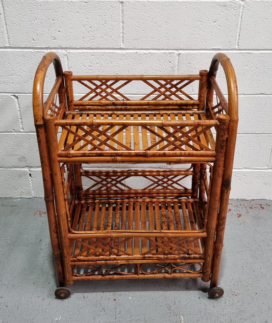Excellent Vintage Tortoiseshell Bamboo two tier auto trolley. It has been sourced locally and is in fantastic original detailed condition .