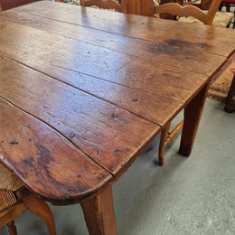 Fabulous early 19th Century Antique Fruitwood Farmhouse table of small proportions and loads of rustic detail. In good original detailed condition.