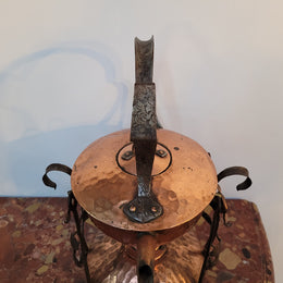 Art Nouveau style rustic Copper kettle on stand. Decorative only.