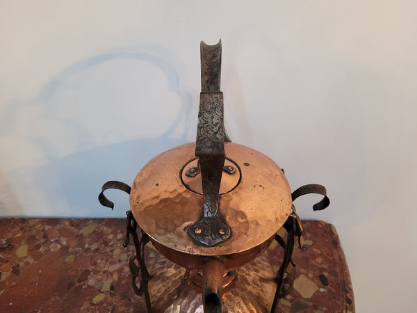 Art Nouveau style rustic Copper kettle on stand. Decorative only.