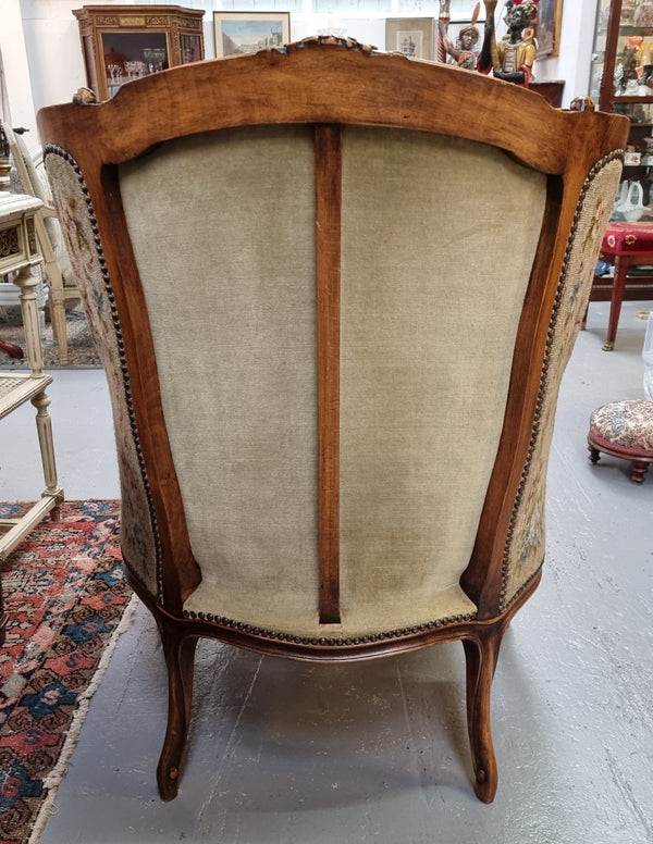 Pair of amazing French Walnut tapestry covered armchairs. The tapestry is in very good condition, please view photos as they form part of the description. Sourced from France and is in good original detailed condition.