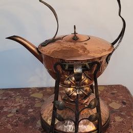 Art Nouveau style rustic Copper kettle on stand. Decorative only.