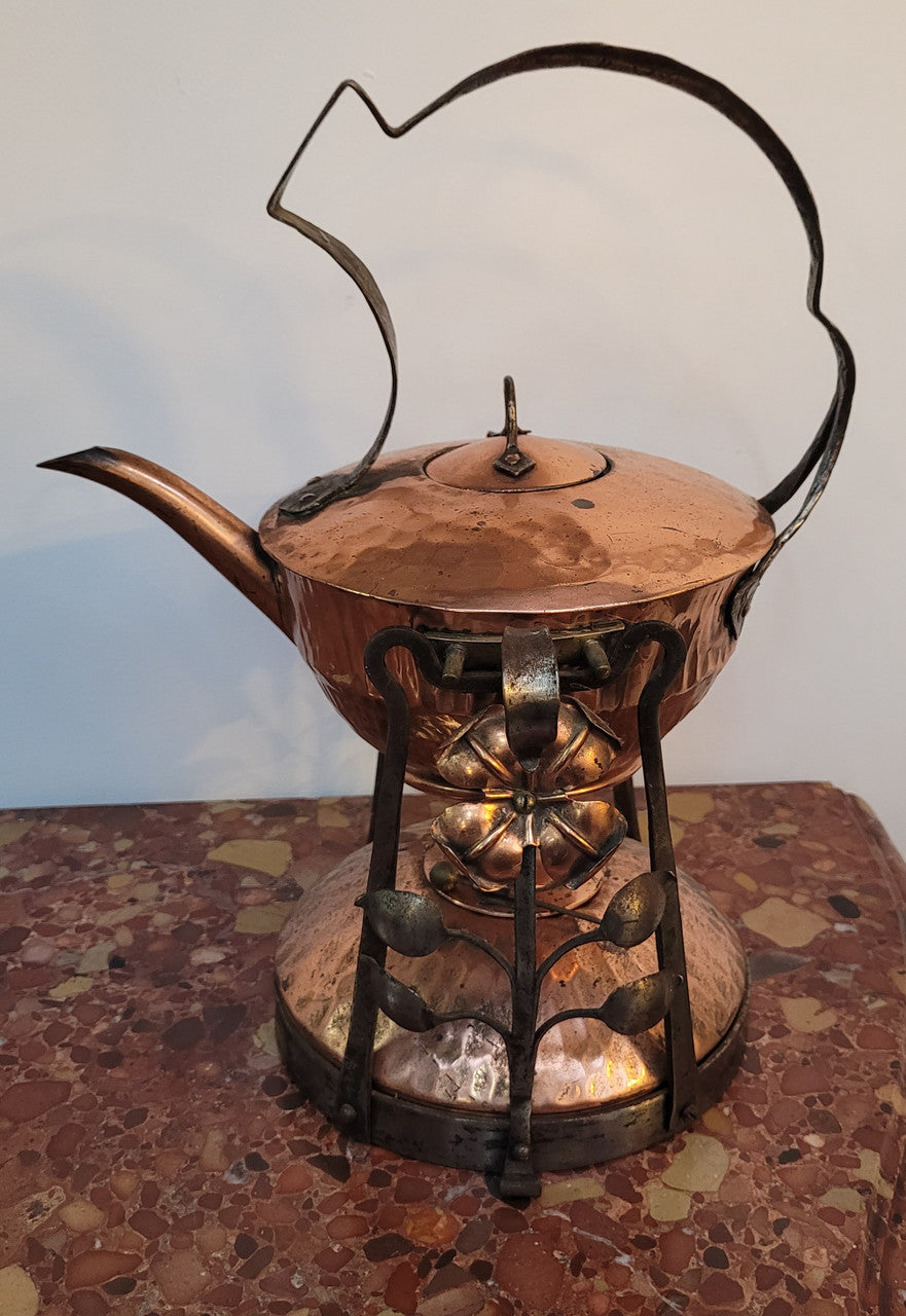 Art Nouveau style rustic Copper kettle on stand. Decorative only.